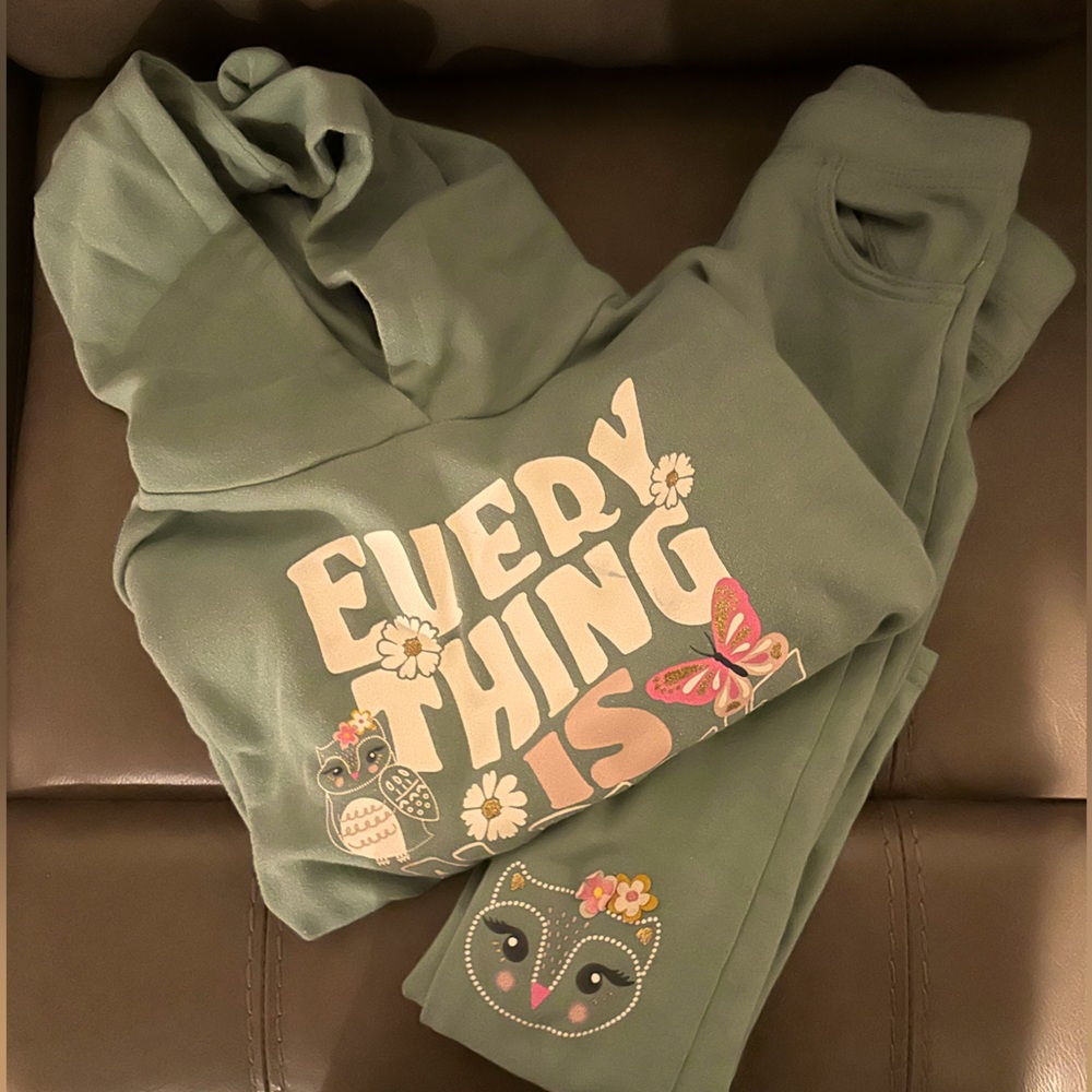 Two piece matching jogging suit